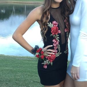 Black mini dress w/ rose appliqué and mesh detail!
